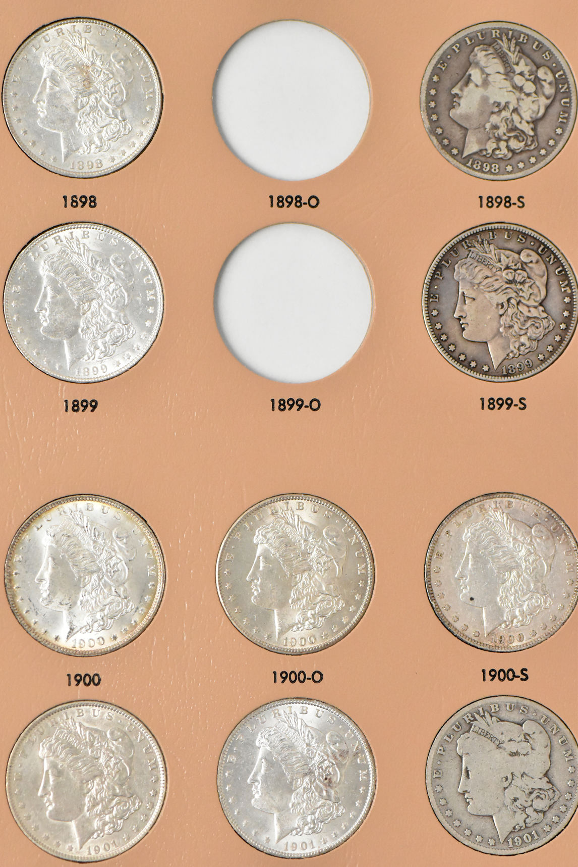Collection of 42 Morgan dollars in a Dansco 7179 album