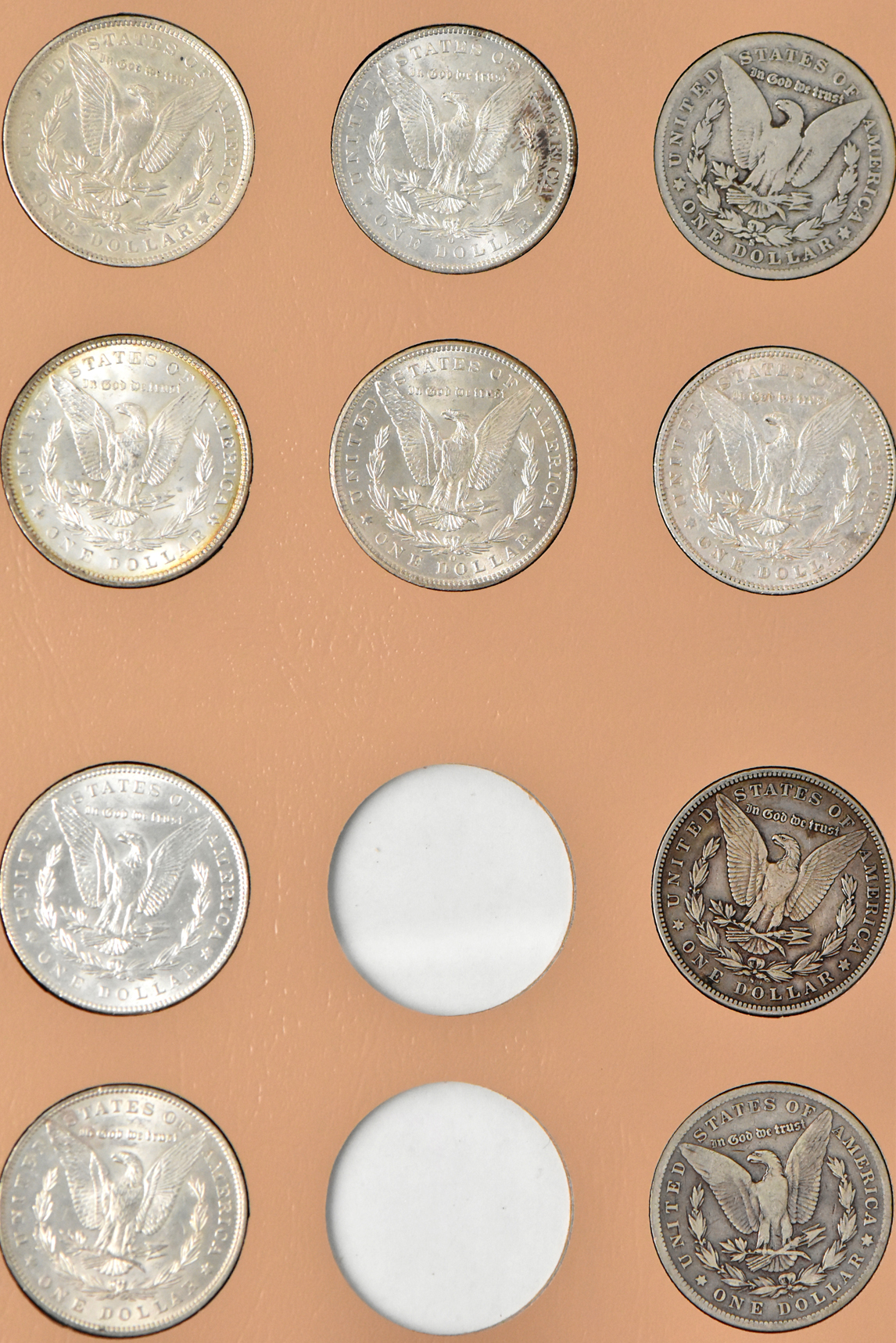 Collection of 42 Morgan dollars in a Dansco 7179 album