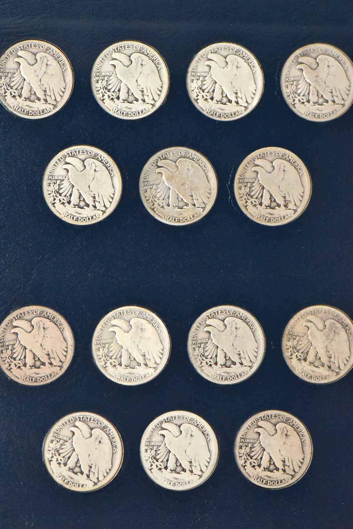 Collection of Walking Liberty half dollars in a complete Whitman 9125 album