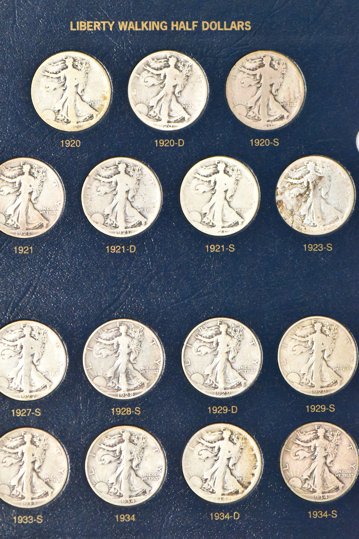 Collection of Walking Liberty half dollars in a complete Whitman 9125 album