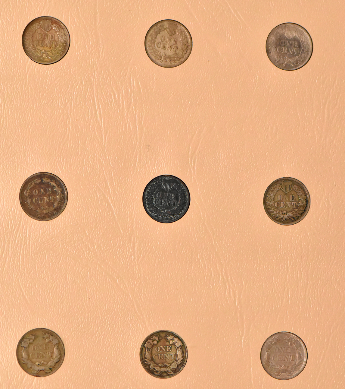 Collection of Flying Eagle and Indian Head cents in a nearly complete Dansco album