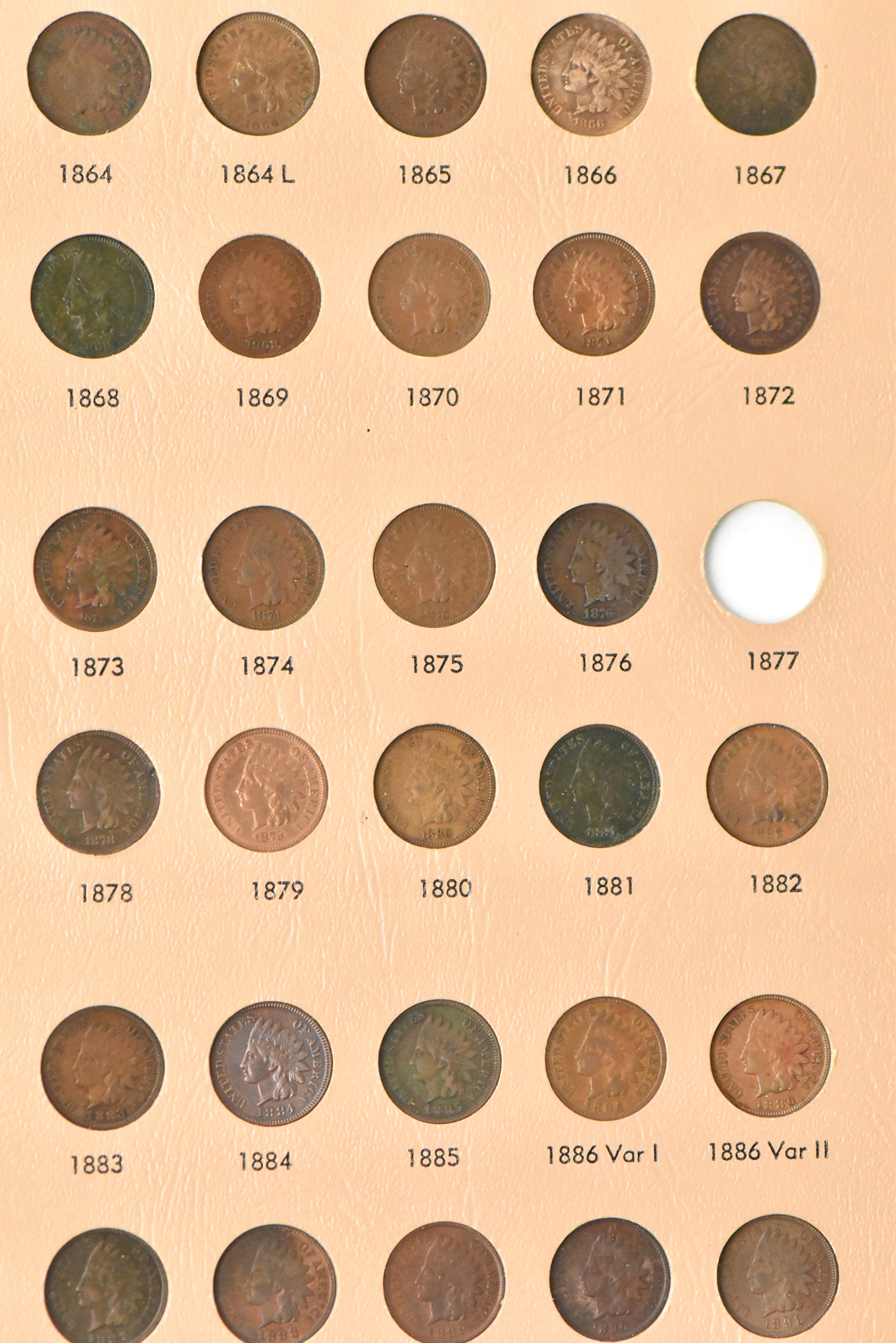 Collection of Flying Eagle and Indian Head cents in a nearly complete Dansco album