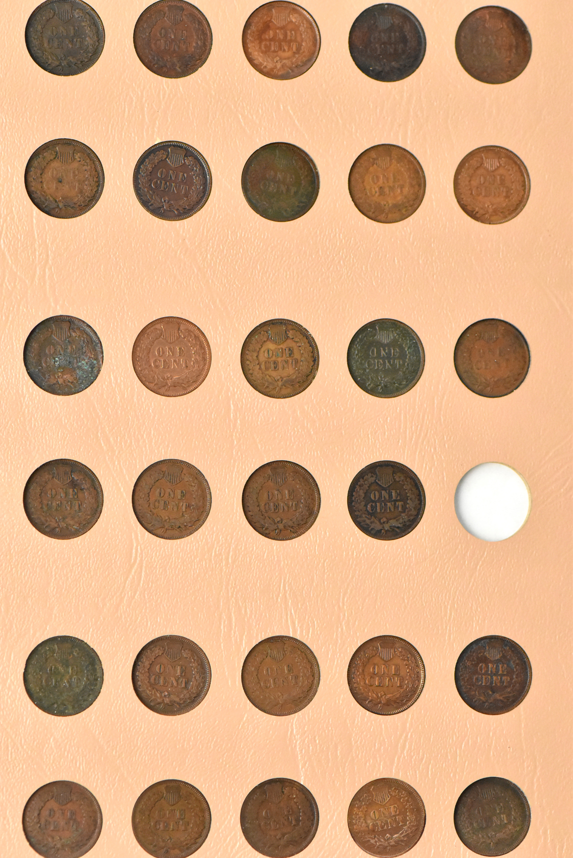 Collection of Flying Eagle and Indian Head cents in a nearly complete Dansco album