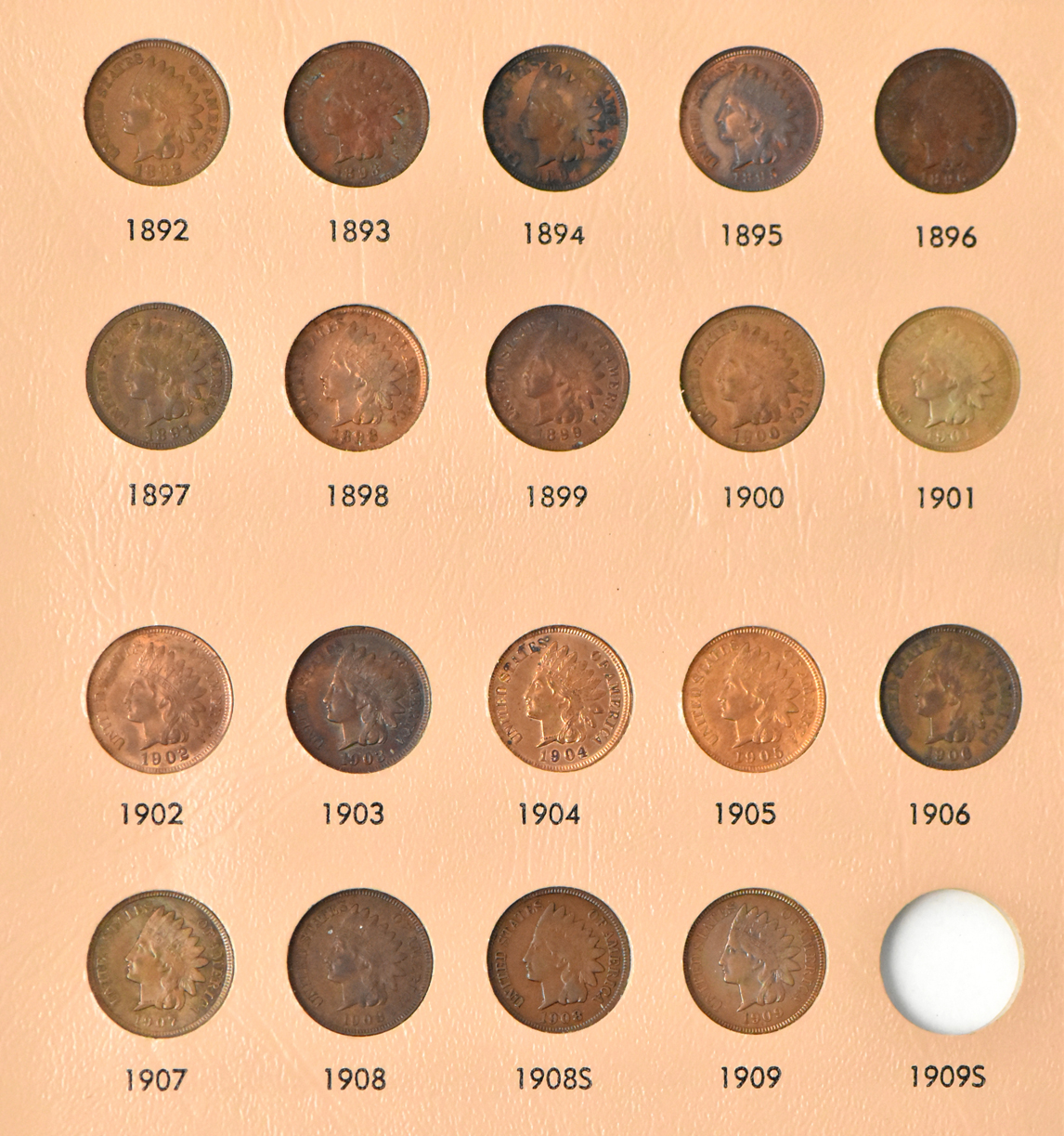 Collection of Flying Eagle and Indian Head cents in a nearly complete Dansco album