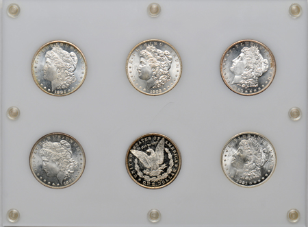 Six Morgan dollars representing All Mints in a Capital Plastics holder