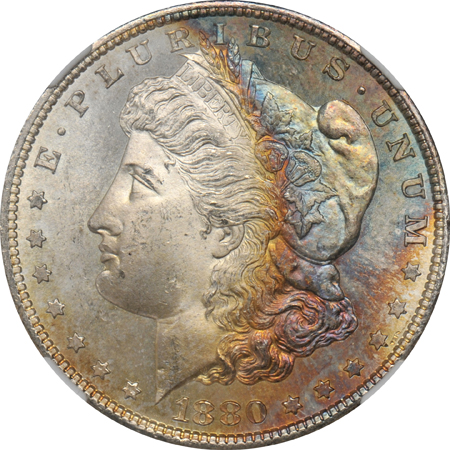Four toned Morgan dollars certified by NGC