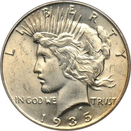 1884-CC Morgan dollar MS-64, and a 1935 Peace dollar MS-63, both PCGS
