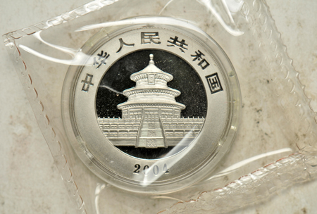 China - Two 2004 1/2oz Palladium Pandas, double sealed, with boxes and certificates