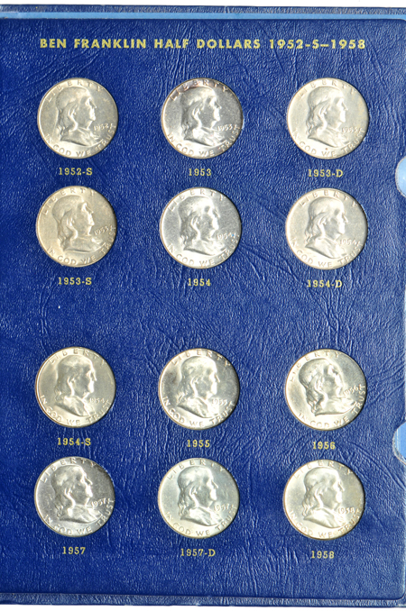 Two complete collections of Franklin half-dollars in Whitman albums