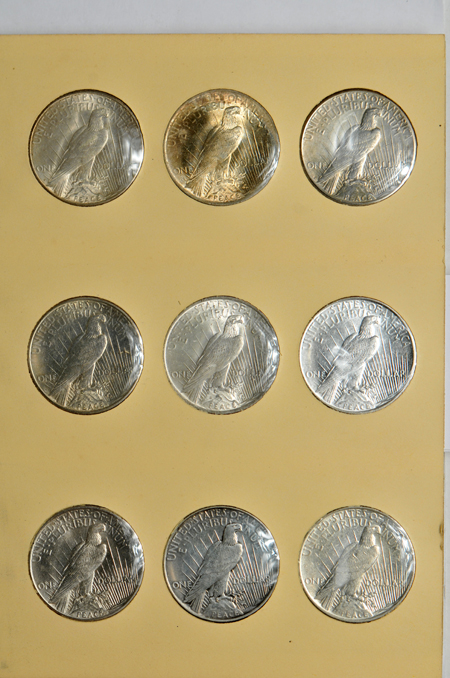 Complete collection of Peace dollars in a Library of Coins album