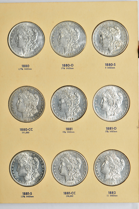Collection of Morgan dollars, complete from 1878 through 1886, in a Library of Coins album