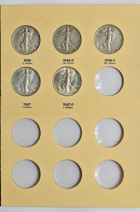 Complete collection of Walking Liberty half-dollars in two Library of Coins albums