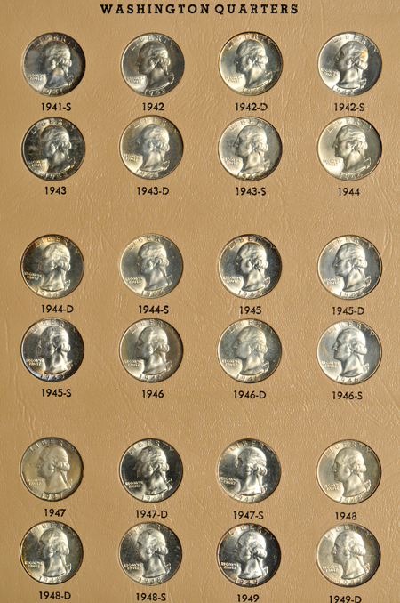 Collections of Roosevelt dimes, Washington quarters, and Kennedy half-dollars in Dansco albums
