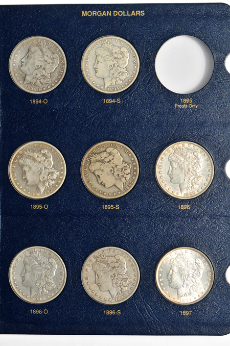 Virtually complete collection of Morgan dollars in two Whitman albums