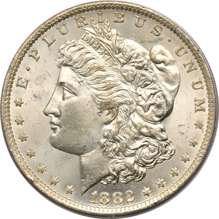 Five Morgan dollars in older PCGS holders