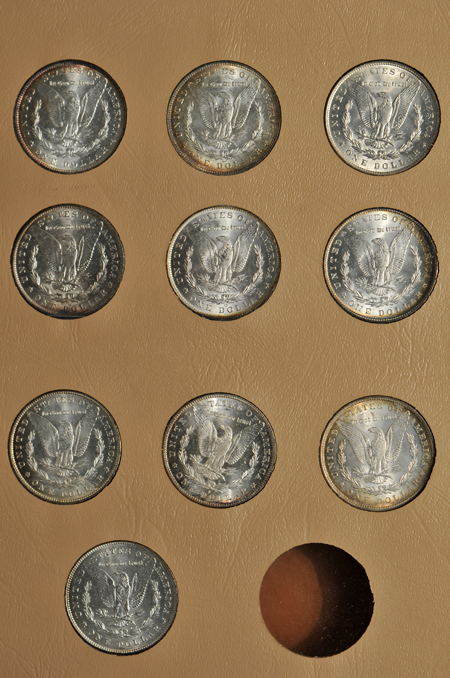 Collection of 22 Morgan dollars in a Dansco 7171 album
