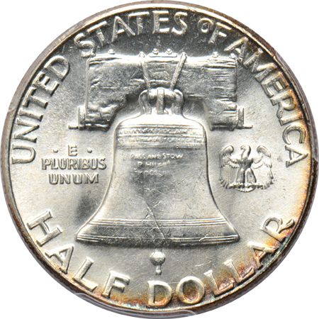 Eight Franklin half-dollars certified by PCGS