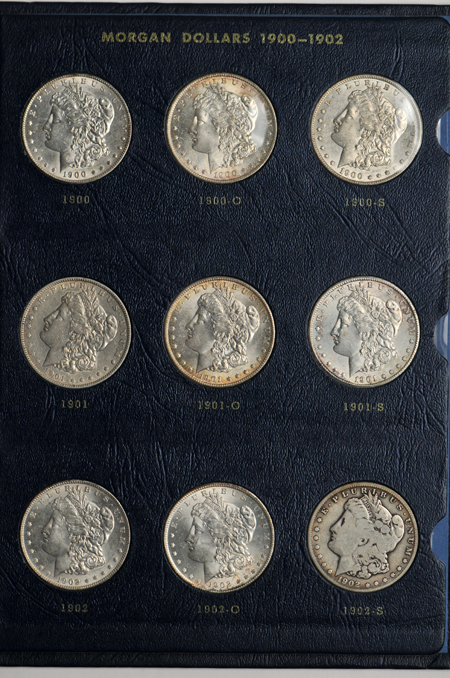 Collection of 27 Morgan dollars, 1897 through 1921, in a Whitman 9429 album