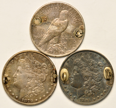 Love token group including three silver dollars and a necklace