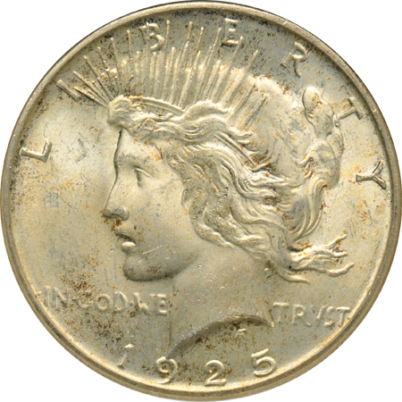 Four Morgan dollars and a Peace dollar, all certified UNC