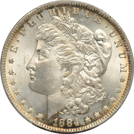 Four GEM Morgan silver dollars certified by PCGS
