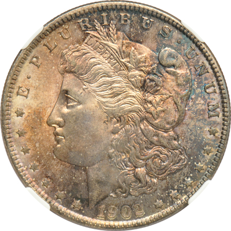 1883-O MS-64+, 1900-O MS-66, and a 1902-O MS-64+, all NGC