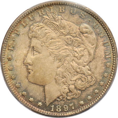 Six Morgan silver dollars certified MS-63 by PCGS