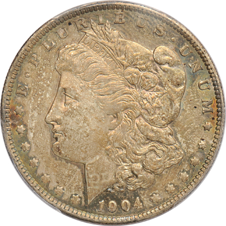Six Morgan silver dollars certified MS-63 by PCGS