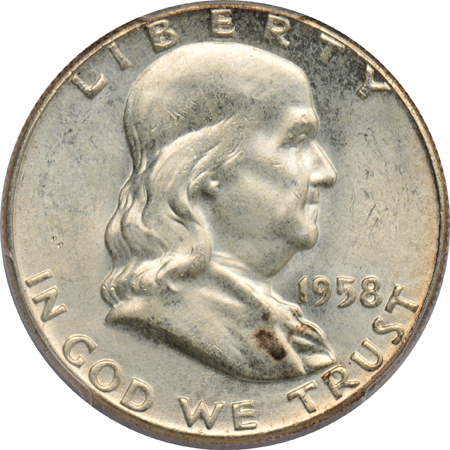 Eighteen Franklin half-dollars certified MS-64 by PCGS