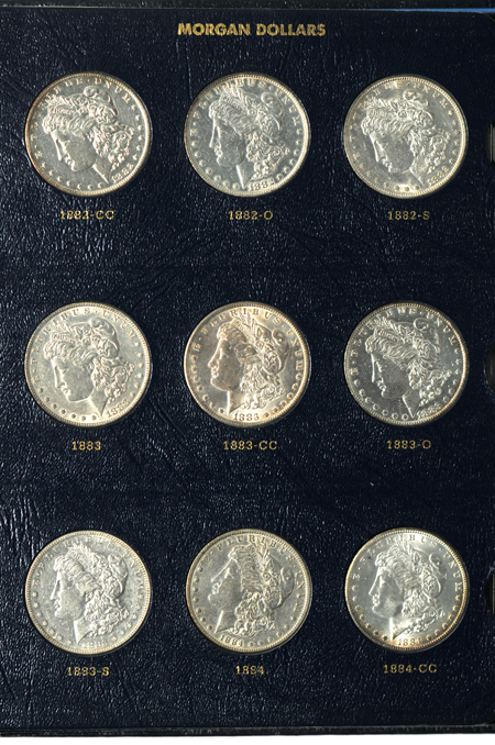 Fifty-one different Morgan silver dollars in a Whitman Classic 9128 album