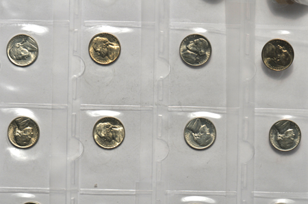 Twenty UNC 1955 Franklin half-dollars, and forty UNC 1943-D Jefferson War nickels