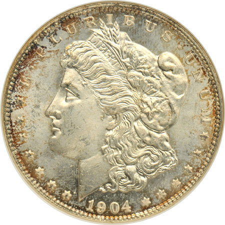 1884-O and 1904-O Morgan silver dollars, plus a 1944-D Walking Liberty half-dollar, all NGC MS-65 (no line)