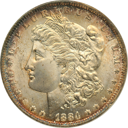 1884-O and 1904-O Morgan silver dollars, plus a 1944-D Walking Liberty half-dollar, all NGC MS-65 (no line)