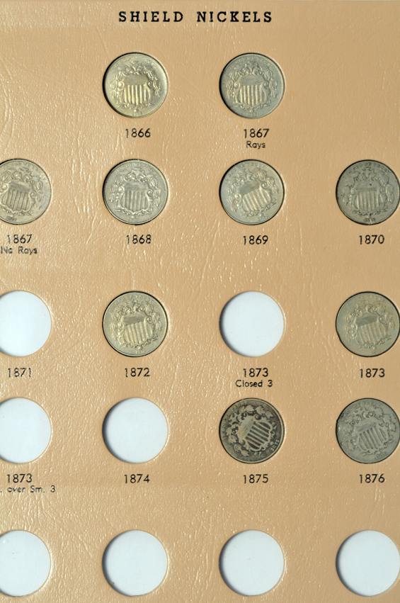 Collection of two-cent pieces, three-cent nickels, and Shield nickels in two Dansco albums