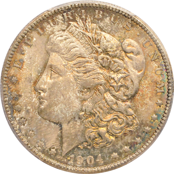 Twelve Uncirculated Morgan silver dollars certified by PCGS