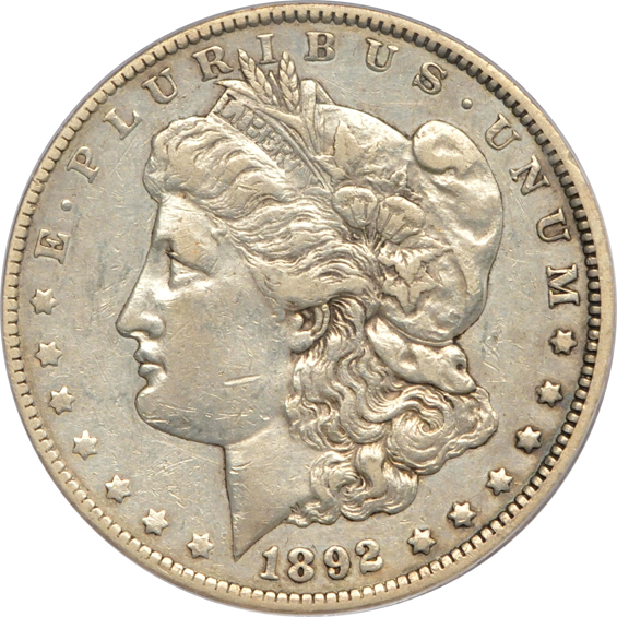 1882-CC MS-63, 1892-CC XF-45, and a 1904-O MS-65, all PCGS