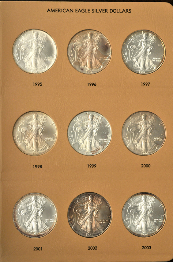 Two collection of BU American Silver Eagles, one through 2011, the other through 2012, both in albums