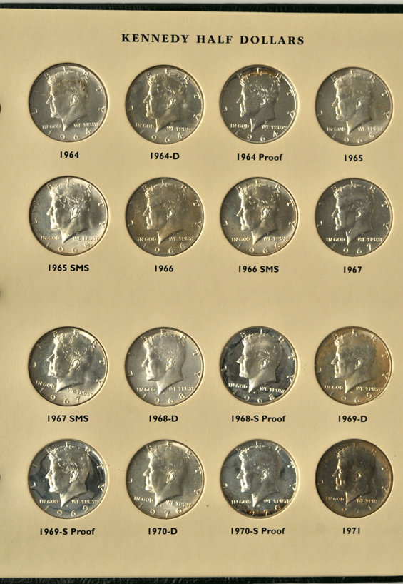 Partial collection of Kennedy half-dollars, plus collection of Jefferson nickels, SBA dollars, Sacajawea dollars, and Eisenhower dollars, in five albums