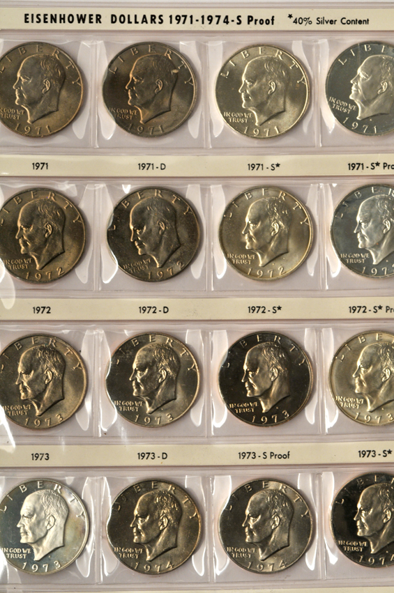 Partial collection of Kennedy half-dollars, plus collection of Jefferson nickels, SBA dollars, Sacajawea dollars, and Eisenhower dollars, in five albums