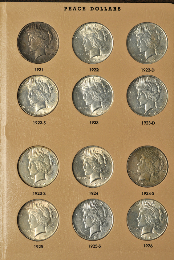 Two partial Peace dollar collections including two 1921 and a 1928