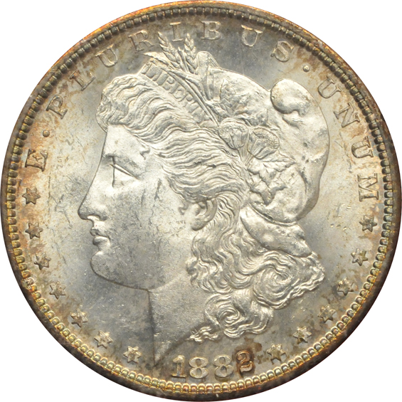 Four Morgan silver dollars from the Redfield collection