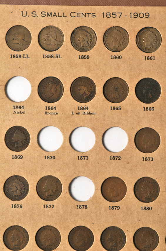 Collections of Flying Eagle cents, Indian Head cents, Lincoln cents, Liberty nickels, Buffalo nickels, and Jefferson nickels in two Wayte Raymond albums