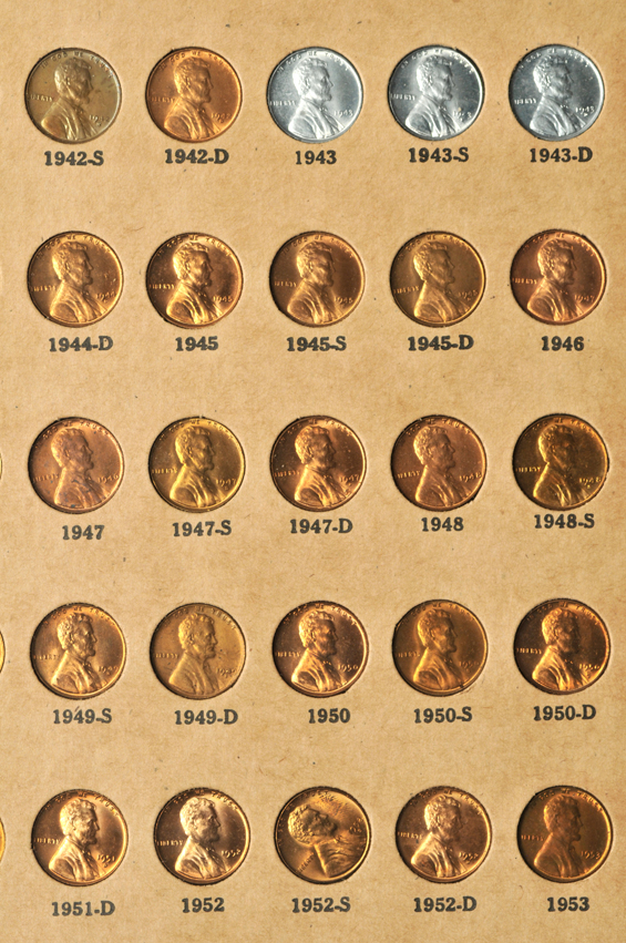 Collections of Flying Eagle cents, Indian Head cents, Lincoln cents, Liberty nickels, Buffalo nickels, and Jefferson nickels in two Wayte Raymond albums