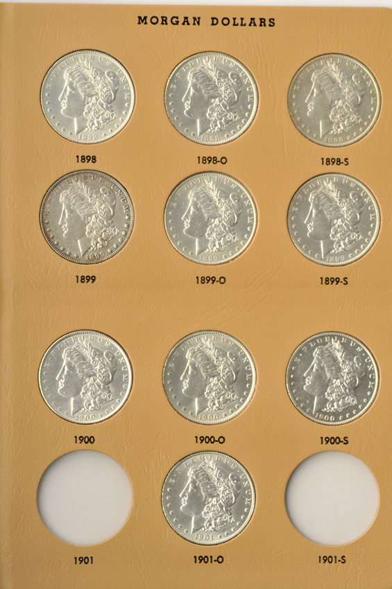 Collection of twenty-eight different Morgan dollars in a Dansco 7179 album
