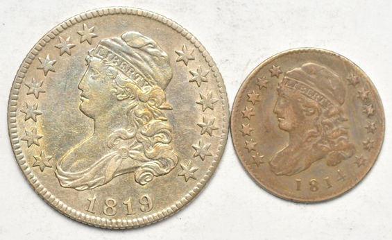 Four silver type coins, as described