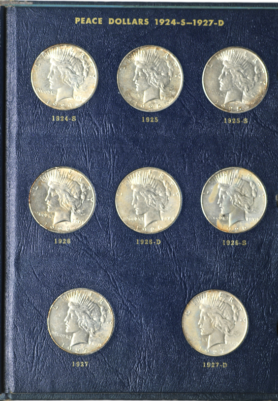 Complete Peace silver dollar collection in a Whitman 9430 album