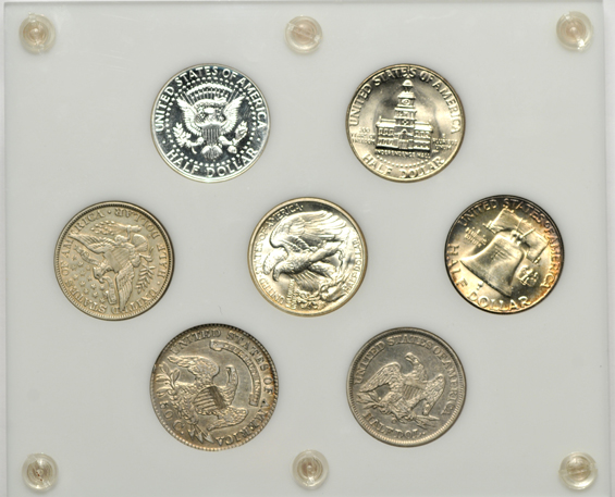 Seven-coin U.S. half-dollar type set in a Capital Plastics holder