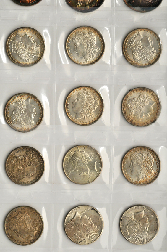 Twelve Morgan silver dollars, three Peace silver dollars, and seven American Silver Eagles
