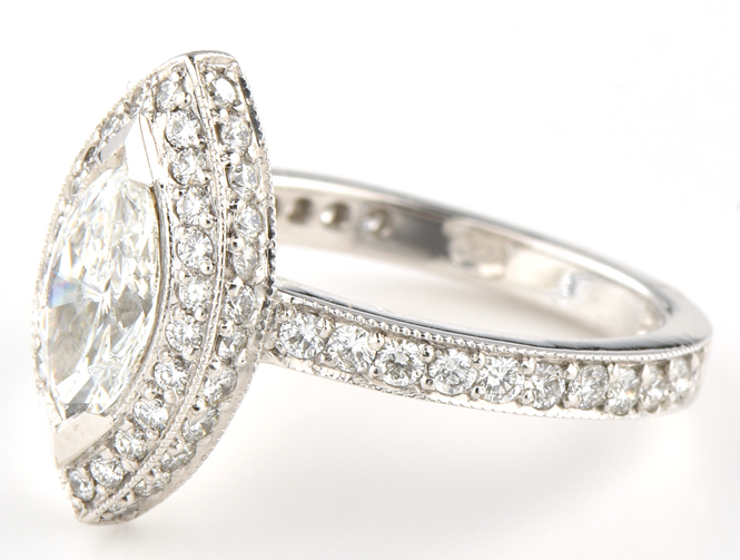 14K White Gold Diamond Engagement Ring with a 1.02 Carat Marquise Diamond, GIA Certified # 12150366, VVS2 Clarity, E Color and .85 Carat Total Weight in Side Round Diamonds, 3.3 dwt, Ring Size 6.5