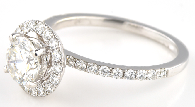 18K White Gold Diamond Engagement Ring with a .90 Carat Round Brilliant, VS2 Clarity. G Color and .40 Carat Total Weight in Round Cut Diamonds, SI1 Clarity, G-H Color.